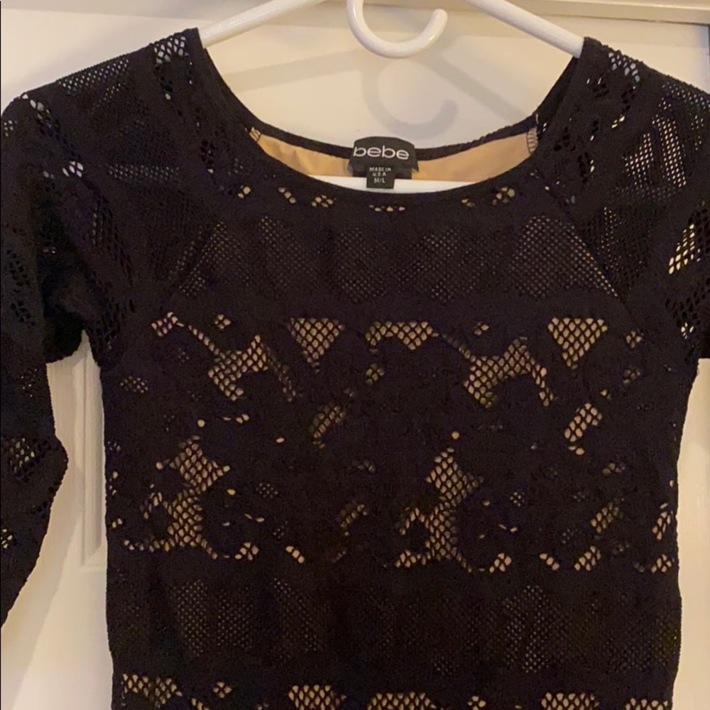 Black lace over a nude base size m/l Bebe dress